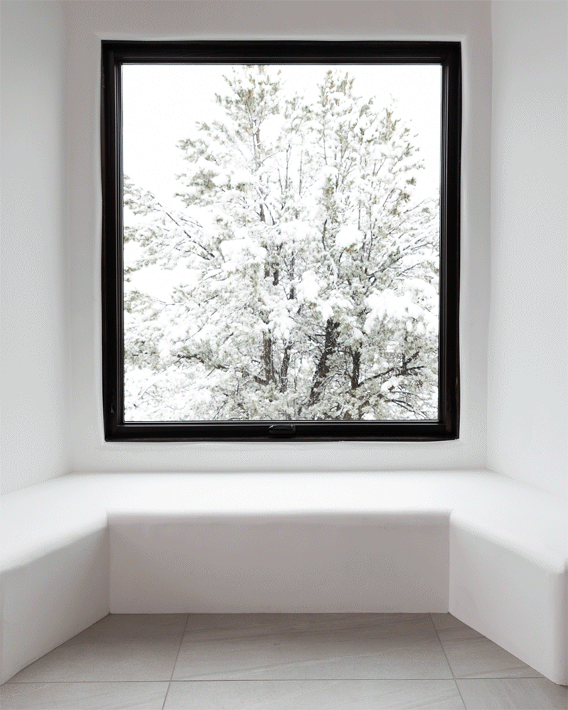 Jules Moore in front of Marvin Signature Ultimate Awning Narrow Frame window