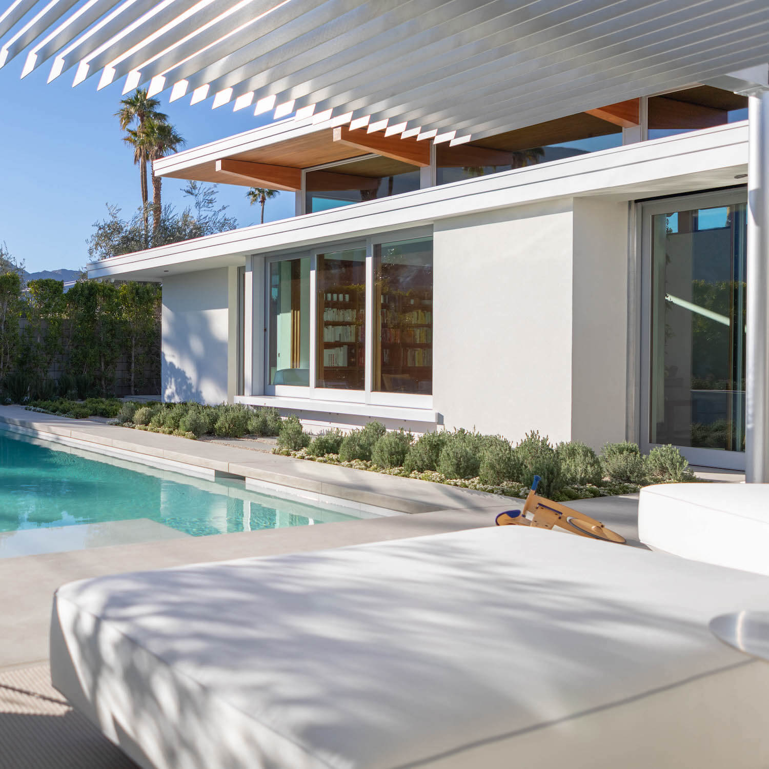 The pool and patio at the Axiom Desert House by Turkel Design.