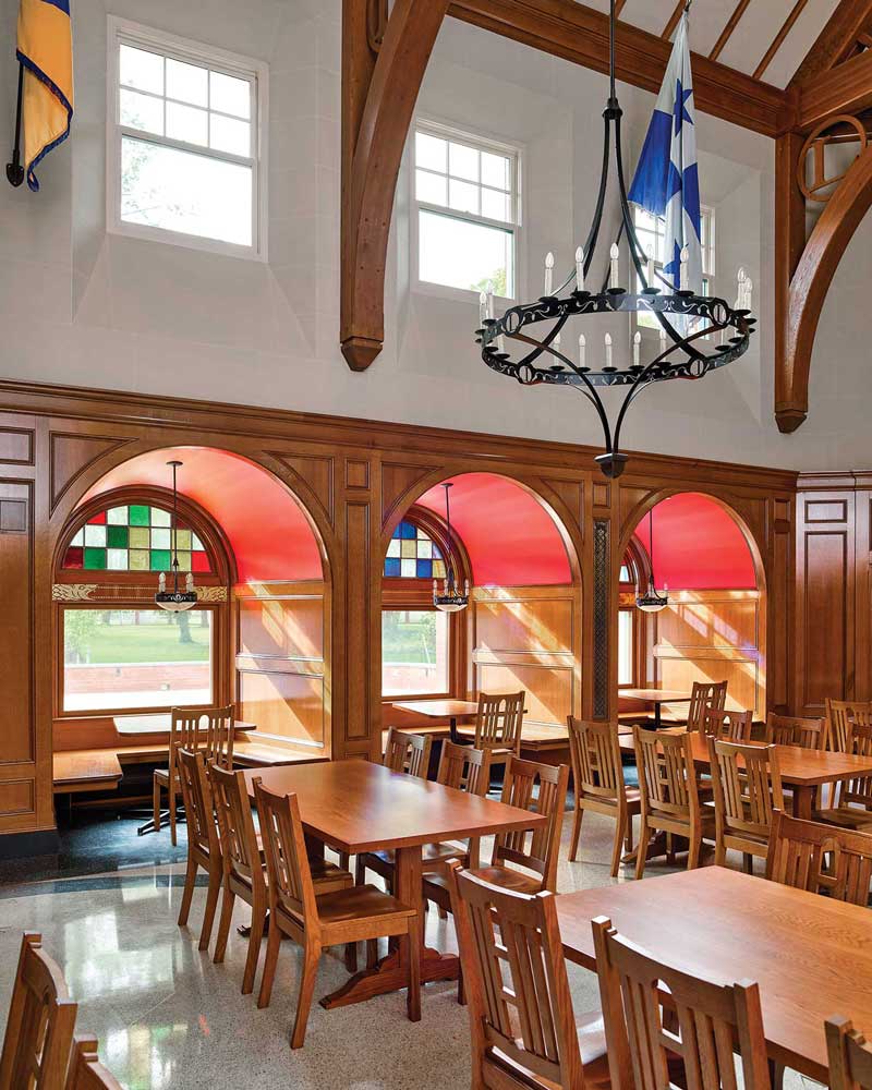 The interior of The Lawrenceville School Abbott Dining Hall features Marvin Ultimate Casement windows, Marvin Ultimate Awning windows, and Marvin Ultimate Double Hung windows and includes historic details to match the rest of the campus.