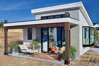 House Beautiful WeShed with Marvin Elevate Sliding Patio Door in Ebony, Essential Casement Windows, and Skycove