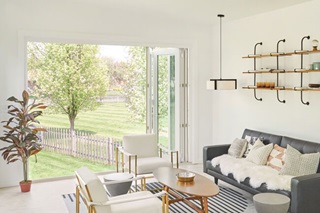 Living room with Marvin Signature Ultimate Bi Fold Door