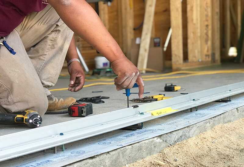 Worker installing Marvin Windows