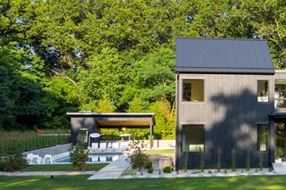 Exterior view of home with pool and Marvin Windows and Doors