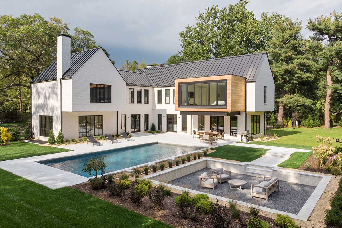 Exterior view of home with pool and Marvin Windows and Doors