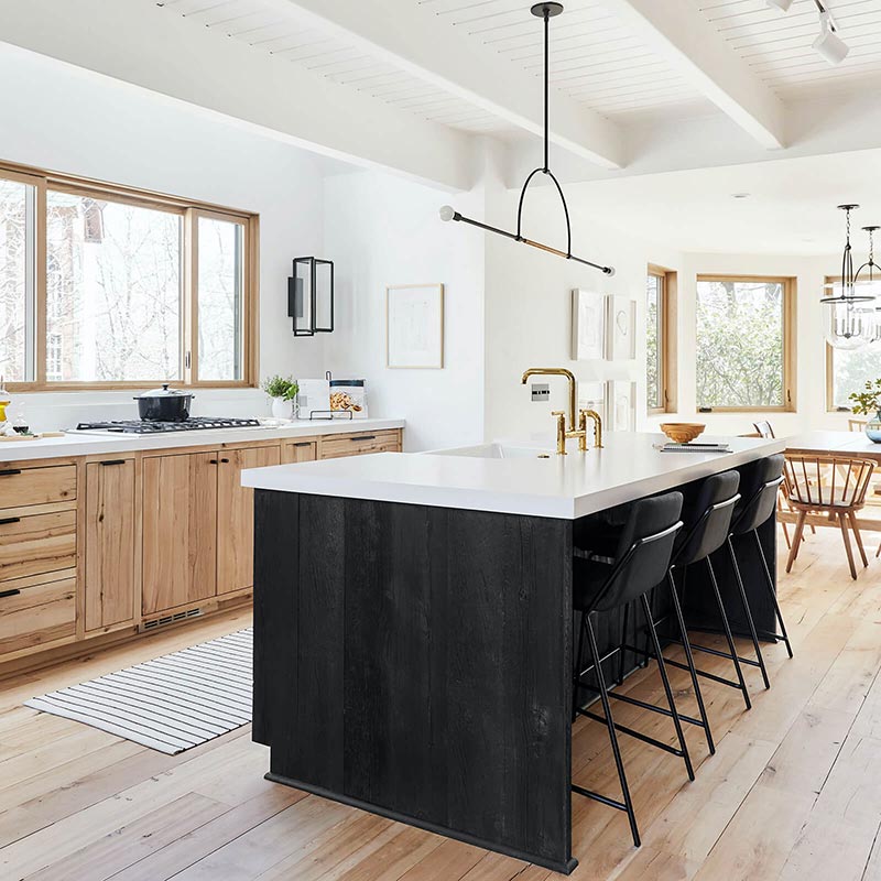 Mountain home kitchen with white oak Marvin Signature Ultimate casement windows