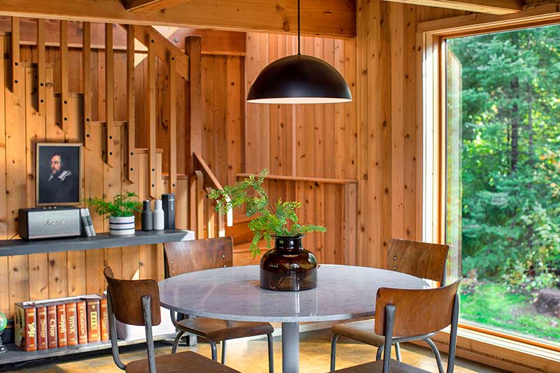 A Marvin Ultimate Picture window in the dining room of The Faux Martha (Melissa Coleman) cabin, the Minne Stuga.