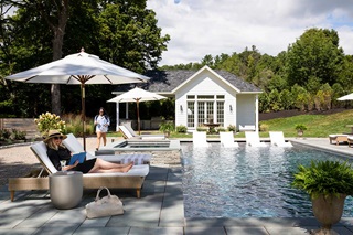 Exterior view of home with pool and Marvin Windows and Doors