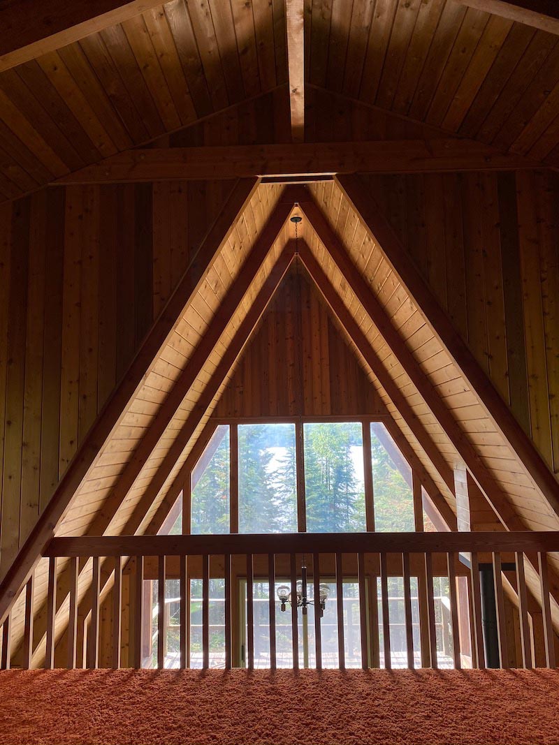 Before images of The Minne Stuga cabin with orange shag carpet