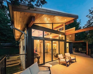 Marvin Essential Sliding Patio door and Marvin Essential Direct Glaze Polygon windows, porch of prairie-style home