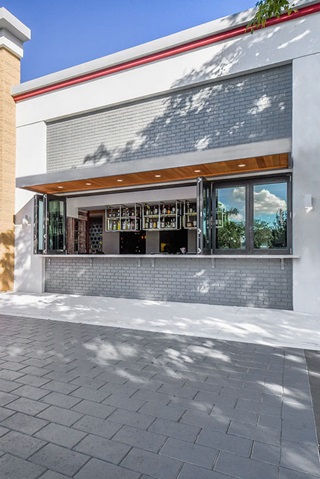 Commercial building with Marvin Signature Coastline Bi-fold Door