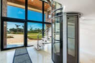 Modern style home with Marvin Signature Coastline Direct Glaze Window and Marvin Signature Coastline Pivot Door