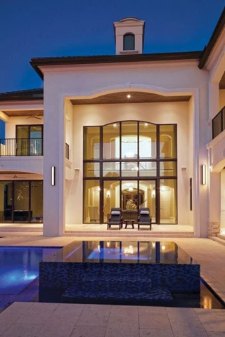 Exterior of home with Marvin Signature Coastline Multi-Slide Door and Marvin Signature Coastline Polygon and Direct Glaze Windows