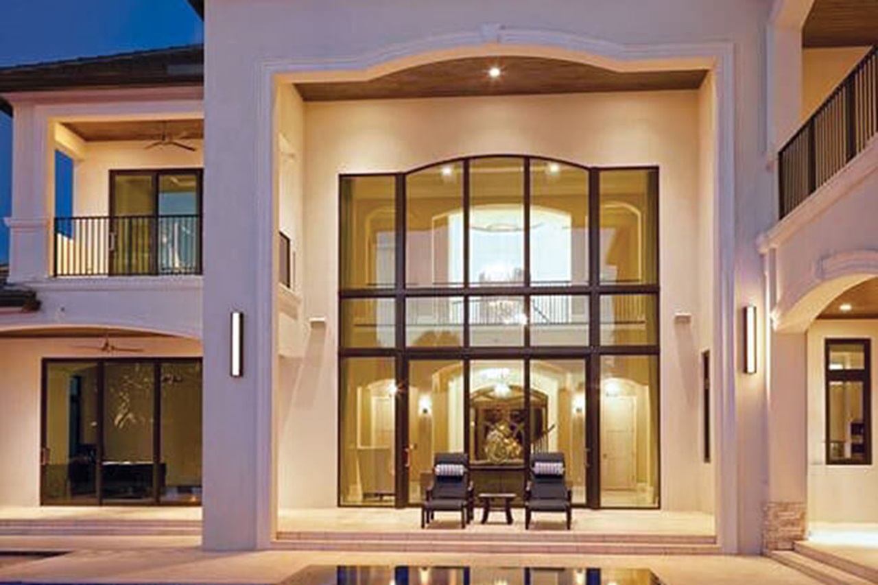 Exterior of home with Marvin Coastline Multi Slide Door and Marvin Coastline Narrow Frame Polygon Windows