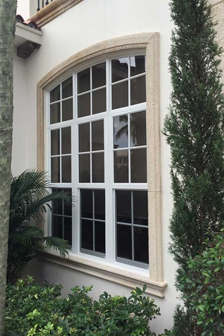 Close up of Marvin Signature Coastline Round Top Narrow Frame and Single Hung Windows