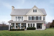 Exterior of home with Marvin Elevate Casement windows, Double Hung windows and Inswing French Doors
