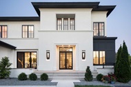 Exterior of home with Marvin Elevate Casement Windows and Inswing French Door