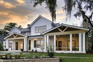 Exterior of home with Marvin Elevate Casement windows and Outswing French Doors