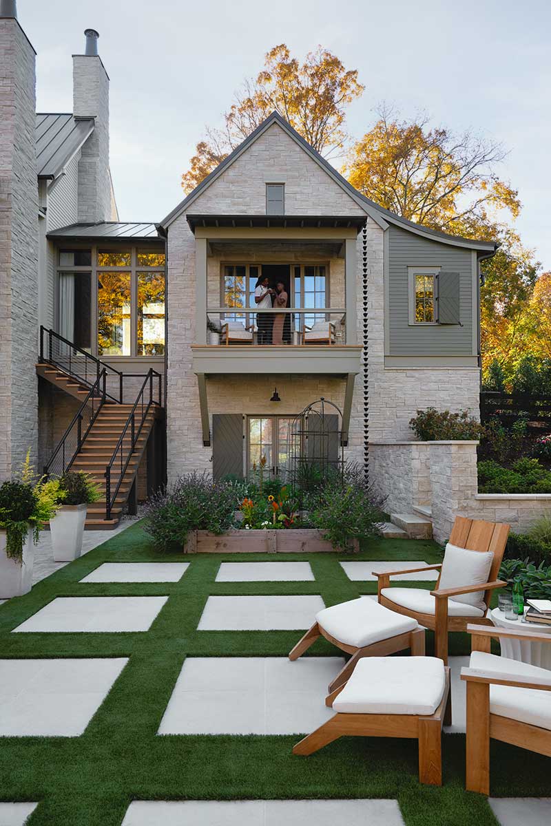 The back of the 2023 Southern Living Idea House in Nashville, TN, featuring Marvin Elevate Inswing Fresh doors, Elevate Direct Glaze windows and Elevate Sliding French doors.
