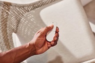 Person with remote for Marvin Awaken Skylight
