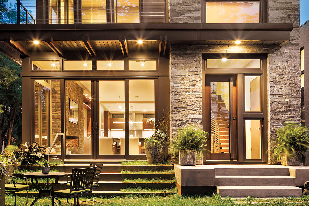 Exterior View Of Contemporary Home With Elevate Swinging French Door
