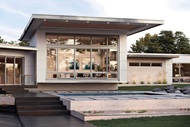 Exterior of home with Marvin Modern casement and awning windows and Multi-slide Door 