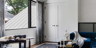 A sitting room in Stay Bungalow in Austin, Texas, featuring Marvin Modern Direct Glaze and Marvin Modern Casement windows.