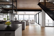 Great room with Marvin Signature Modern direct glaze windows and Multi-Slide Door