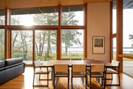 Dining room with Marvin Signature Ultimate Direct Glaze and Multi-Slide Door