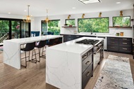 A modern kitchen featuring a Marvin Signature Ultimate Sliding Patio door