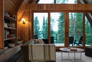 The inside of an A Frame cabin featuring a Signature Ultimate Sliding French Door g2