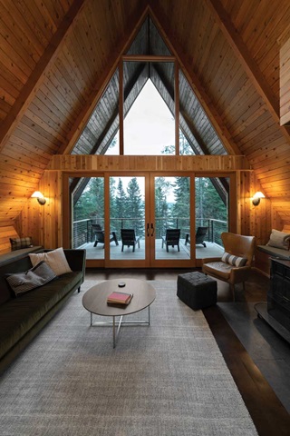 The inside of an A Frame cabin featuring a Signature Ultimate Sliding French Door g2