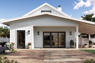 The exterior of a white home featuring a Marvin Signature Ultimate Sliding French Door g2