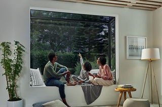 family sitting in Marvin Skycove box window structure