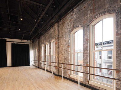 Interior of historic building with Marvin Ultimate Double Hung Round Top Magnum Windows