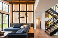 A living room with a Marvin Ultimate sliding door and direct glaze windows