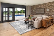 Sitting room with Marvin Signature Ultimate Bi-Fold Door