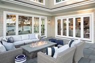 Exterior of home with Marvin Signature Ultimate Bi-fold doors and Elevate Inswing French door, Double Hung Windows and Double Hung Picture Windows