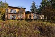 Exterior of home with Marvin Signature Ultimate Multi-Slide Door, direct glaze rectangle and direct glaze polygon windows