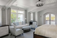 Bedroom with Marvin Signature Ultimate Picture Window, In-Swing French Door and Arch Top Double Hung windows