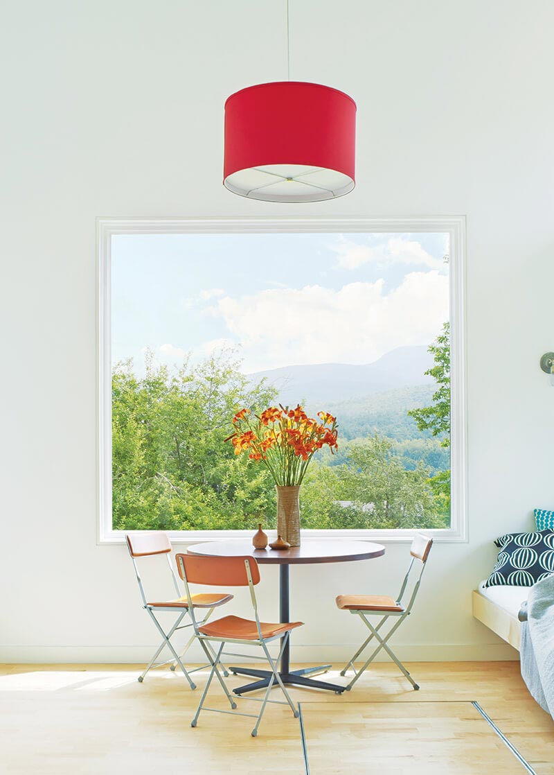 The view out a window inside Micro House facing Camel’s Hump peak in Vermont.