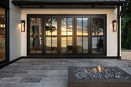 Exterior view of deck with Marvin Signature Ultimate Bi-Fold door closed door