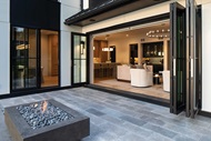 Exterior view of deck with Marvin Signature Ultimate Bi-Fold door