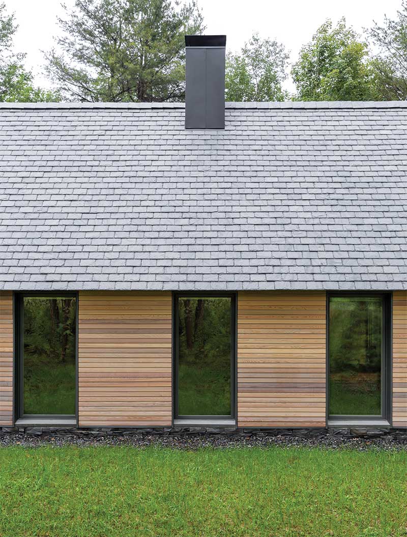An exterior photo of the Marlboro Music Cottages, featuring Marvin Ultimate Casement windows.