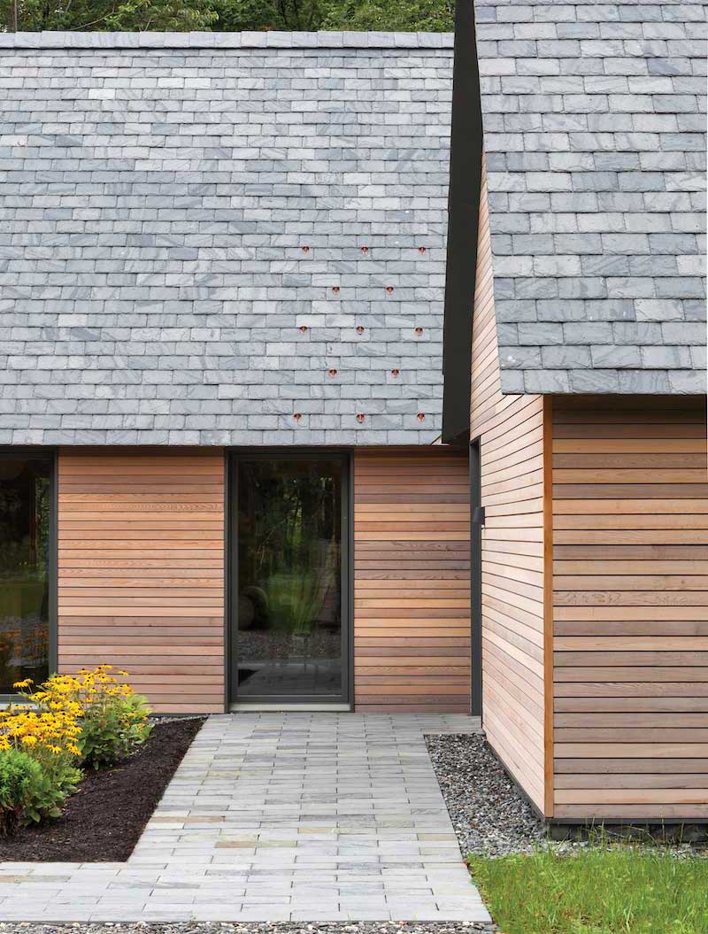 An exterior photo of the Marlboro Music Cottages, featuring Marvin Ultimate Casement windows.