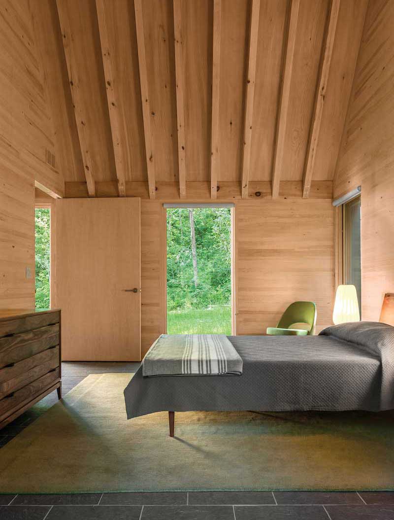 Marvin Ultimate Casement windows in a contemporary bedroom of the Marlboro Music Cottages.