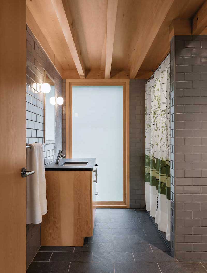 Marvin Ultimate Casement windows inside a contemporary bathroom at the Marlboro Music Cottages.