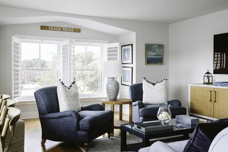 The living room in a condo at The Standard with nautical décor and Marvin Ultimate Double Hung G2 windows.