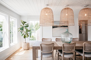 The dining room of Liz Joy’s remodeled Connecticut home, featuring Marvin Elevate casement windows.