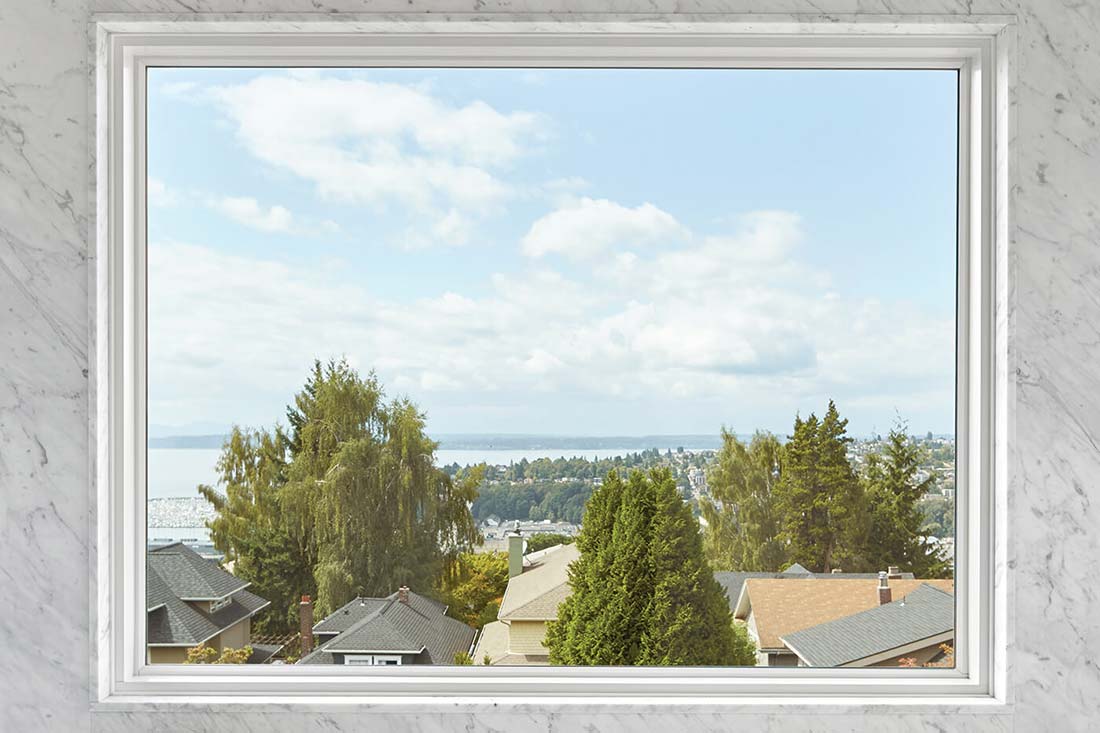 A picture window in a Queen Anne-style home.