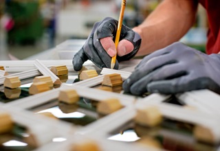 Man With Gloves Building A Signature Ultimate Window With Divided Lites